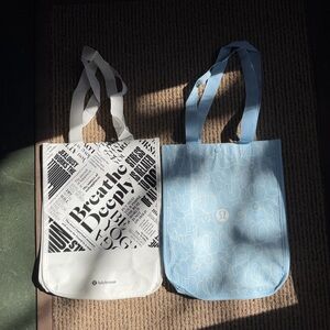 lululemon athletica small totes in blue and black/white
